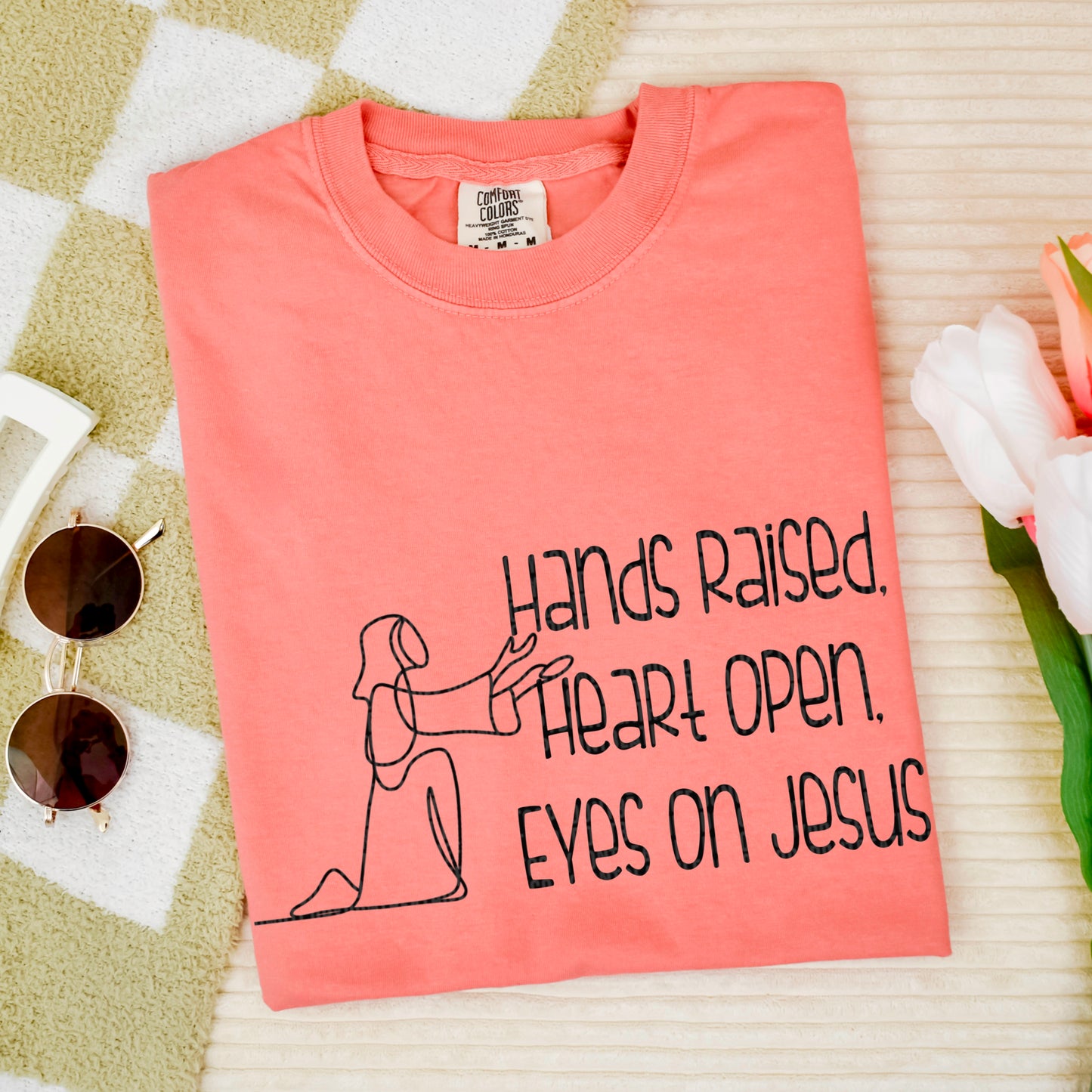 Hands raised, heart open, eyes on Jesus